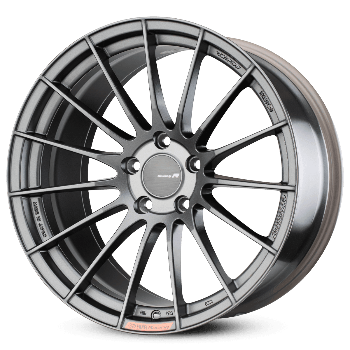 Close-up of a metallic car wheel with a multi-spoke design and a central hubcap.
